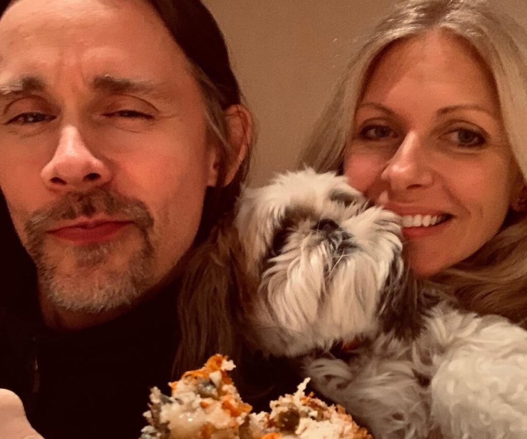 Myles Kennedy with his wife and dog.