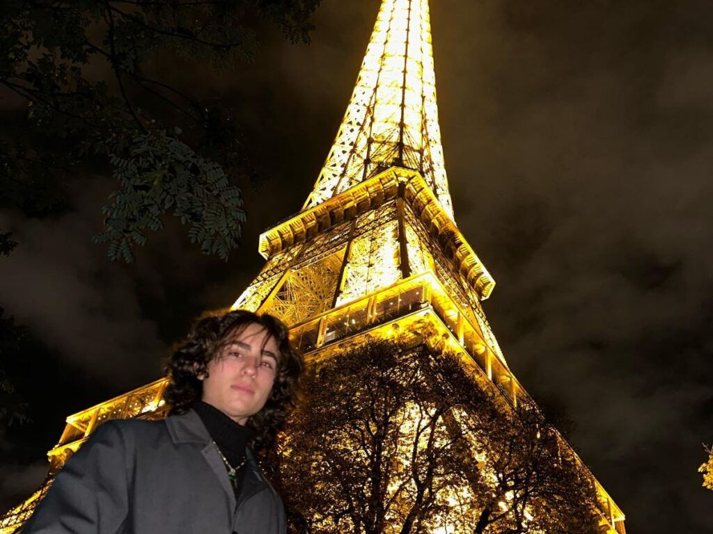 Miles Mitchell in Eiffel Tower.