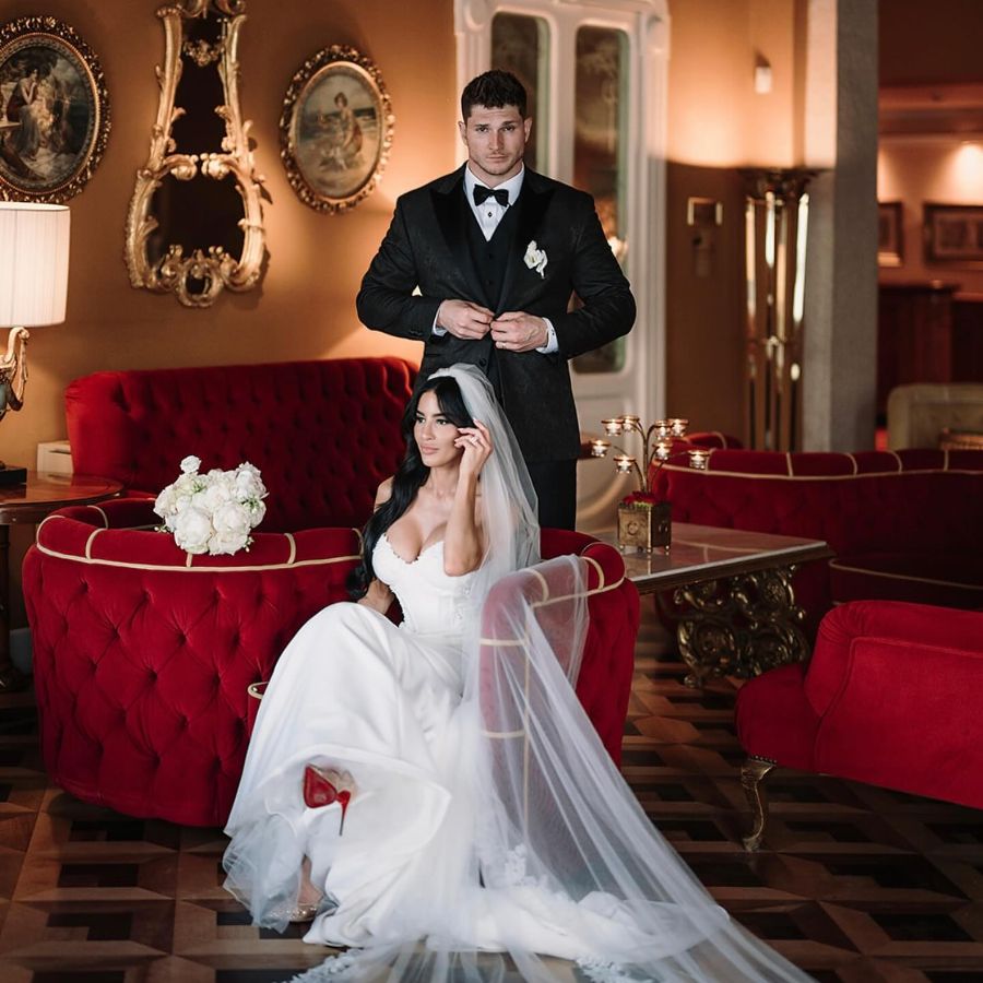 Laith Wallschleger and his wife in their wedding dress.