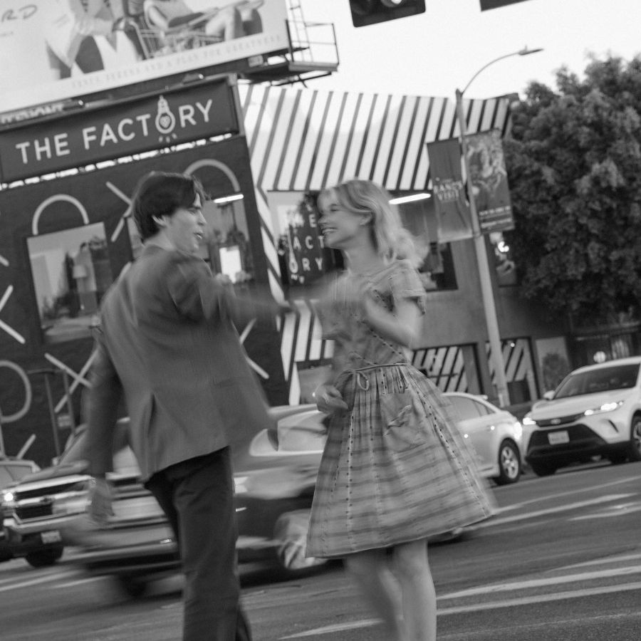 Elle Chapman and her boyfriend Patrick Luwis dancing in the street.