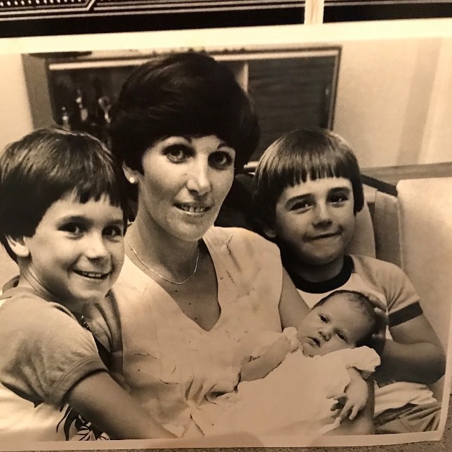 Andrew Johns with his mother and siblings.